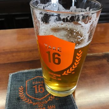 Take 16 Brewing - a pint of beer on a coaster - Brewpubs Near Me - Luverne, Minnesota