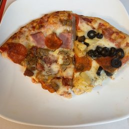 Meat lover slice and slice of Hawaiian pizza w/ pepperoni instead of Canadian ham Meat lover slice and slice of Hawaiian pizza w/ pepperoni instead of Canadian ham