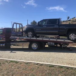Premier Towing - Loading up for the trip to the repair shop.