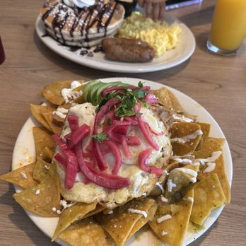 Huevo House - Birria CHILAQUILES verde with over easy eggs and avocado - Breakfast & Brunch Near Me - Bakersfield, California Huevo House - Birria CHILAQUILES verde with over easy eggs and avocado - Breakfast & Brunch Near Me - Bakersfield, California