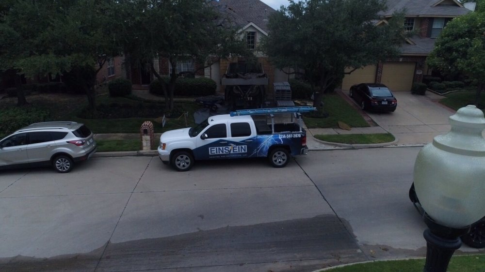 Slide of Einstein Roofing and Restoration