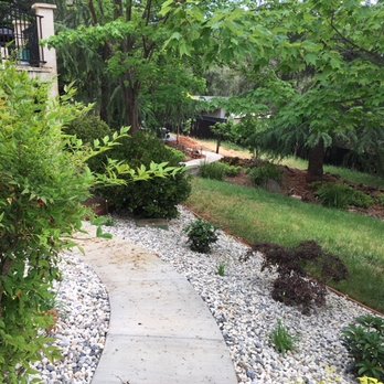 Paradise View Landscaping - The new sidewalk joins the house to a more distant area of the property (look to the old rock fence) - Landscaping Near Me - Grass Valley, California Paradise View Landscaping - The new sidewalk joins the house to a more distant area of the property (look to the old rock fence) - Landscaping Near Me - Grass Valley, California