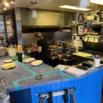 Mom's Kitchen - a woman preparing food in the kitchen - Breakfast & Brunch Near Me - Gloucester, Massachusetts Mom's Kitchen - a woman preparing food in the kitchen - Breakfast & Brunch Near Me - Gloucester, Massachusetts