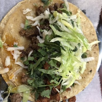 El Taco Loco - Campechanos (chorizo and steak) only $2.00!! Comes with cilantro and lime. I added lettuce and cheese. Delicious!! - Mexican Near Me - Coldwater, Michigan