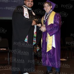Legacy College Prep - Valedictorian Alex with Mr E on graduation ceremony.