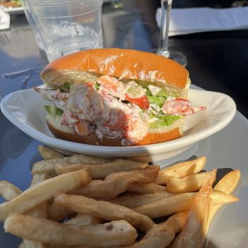 Mohegan Restaurant & Bar - Lobster roll for $33. Mostly lettuce in the roll. - New American Near Me - New Shoreham, Rhode Island Mohegan Restaurant & Bar - Lobster roll for $33. Mostly lettuce in the roll. - New American Near Me - New Shoreham, Rhode Island
