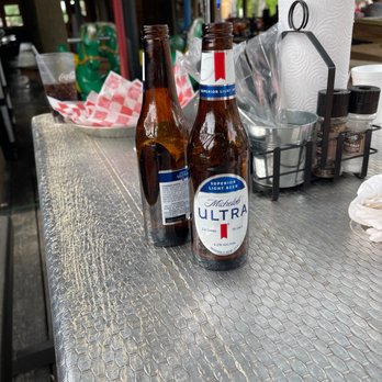 Clay's Restaurant - Two empty beers with nobody coming coming back asking if we needed anything else. - Burgers Near Me - Houston, Texas