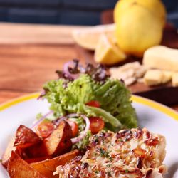 "Sunset Cruises" Almond crusted Sole fish fillet in lemon butter sauce; choice of herbed rice or garden salad