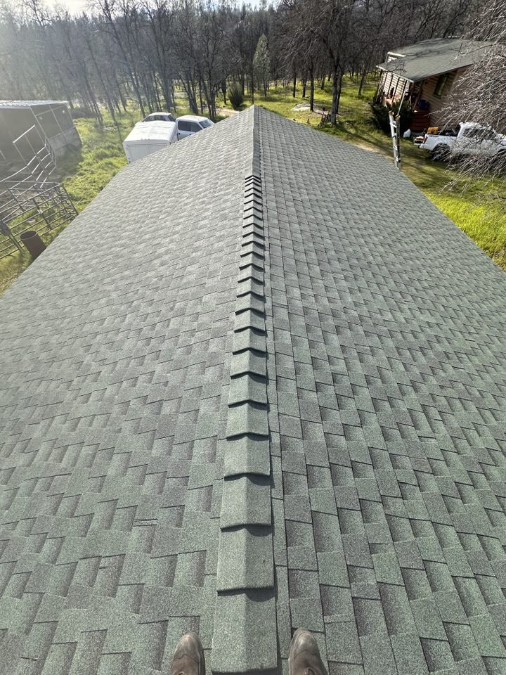 Slide of Tugwell Roofing