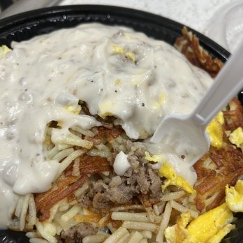 Waffle House - Double hash browns with smothered onions, cheese, eggs, & sausage gravy! Sooo good! - American Near Me - FORT LAUDERDALE, Florida