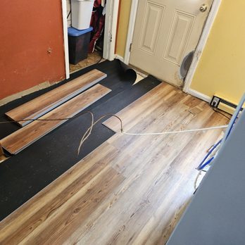 JB Flooring KY - a hardwood floor being installed - Flooring Near Me