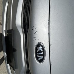 Caliber Collision - Before. Hood and front bumper