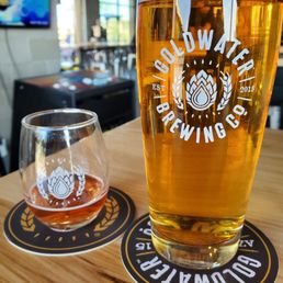 Taster of Desert Rose and full pour of Cider Corp P.O.G.