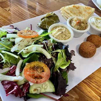 Athens Café - Delicious vegetarian plate with falafel, pita, dolma, green salad, hummus, baba ghanoush, and tzatziki - Mediterranean Near Me - Austin, Texas