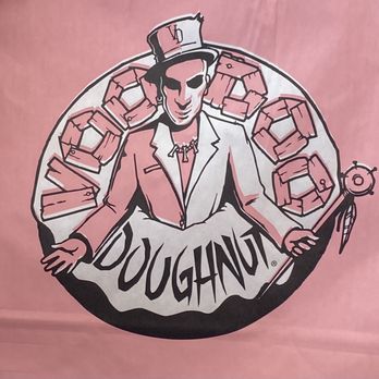 Voodoo Doughnut - An illustration features a person in a suit and top hat, with a mask-like face, surrounded by couches and holding a cane, on a pink background. - Donuts Near Me - Denver, Colorado
