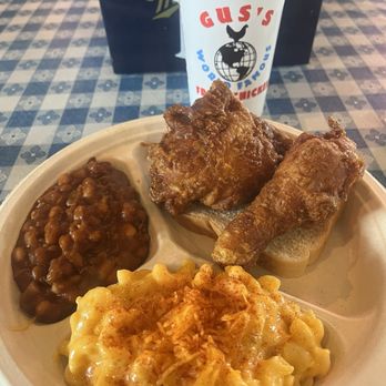 Gus's World Famous Fried Chicken - 2 piece fried chicken with baked beans and Mac and cheese. - Southern Near Me - Memphis, Tennessee Gus's World Famous Fried Chicken - 2 piece fried chicken with baked beans and Mac and cheese. - Southern Near Me - Memphis, Tennessee