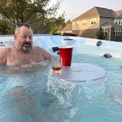 Motor City Hot Tubs, Swim Spas and Outdoor Living - Coast Spas Horizon Model. Infinity Edge with waterfall table.