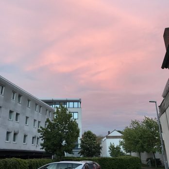 Hotel L'Escala - Side of the hotel at sunset - Hotels Near Me - Dreieich, HE