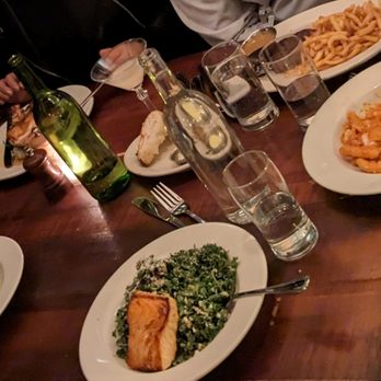 The Smith - The table.  Kale salad in front. - New American Near Me - New York, New York