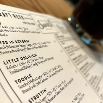 Brewery Saint X - a menu on a wooden table - Breweries Near Me - New Orleans, Louisiana Brewery Saint X - a menu on a wooden table - Breweries Near Me - New Orleans, Louisiana