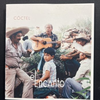 El Encanto - This same little boy is the owner and this time with his father on the left & Grand Father ( On Guitar) and his uncles on the Right. - Bars Near Me - Kirkland, Washington