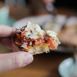 The Russian - Lemon house cured Salmon Tartare, Free Range Poached Egg, Cress, Dill Creme Fraiche, Multi-Grain Toast ($17.90)