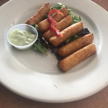 El Cristo Restaurant - Fried yucca w/ side sauce that really made the dish. - Cuban Near Me - MIAMI, Florida