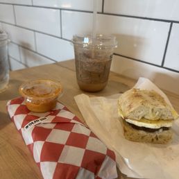 4 Cheese Burrito, dark chocolate latte, and breakfast sandwich.