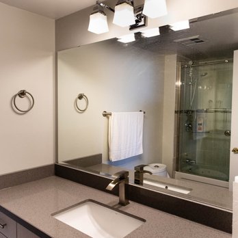 Super Star Group - a bathroom with a sink and mirror - Signmaking Near Me - Markham, Ontario
