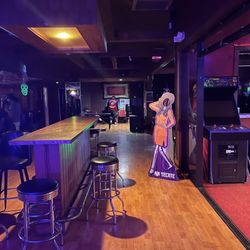 The Stardust Club - This is the main bar area that you'll see after those three paces. On the right is a pool table area on the left is the bar.