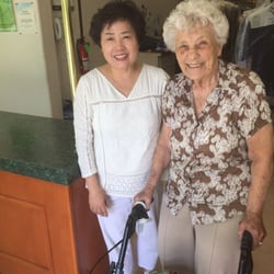 Russell Heath Cleaners - The current owner of Russell Heath Cleaners with Winifred Heath (Russell Heath's widow)