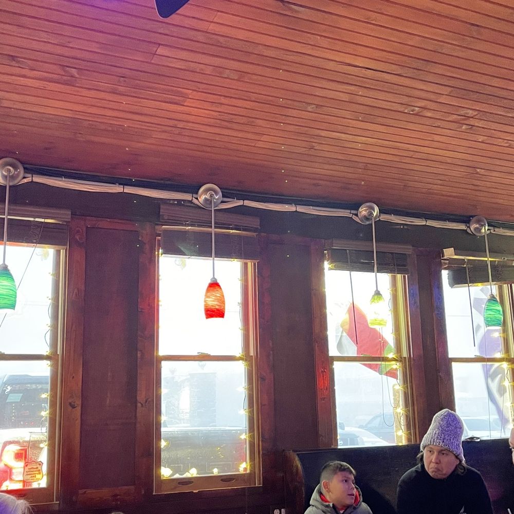 Famous Brick Oven Pizzeria - Outdoor view in winter from front porch seating area - Pizza Near Me - Beech Mountain, North Carolina Famous Brick Oven Pizzeria - Outdoor view in winter from front porch seating area - Pizza Near Me - Beech Mountain, North Carolina