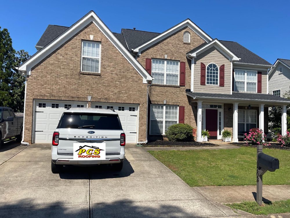 Slide of PCS Roofing