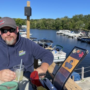 Captain Jack's - View from side of the table.  Just watching the boats was awesome. - American Near Me - Naples, Maine