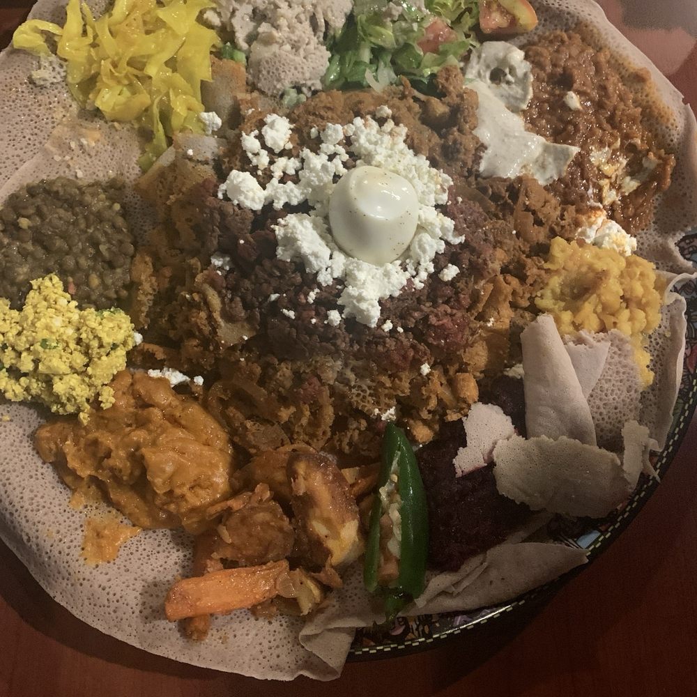 Effoi Restaurant - Special veggie combo and doro wat - Ethiopian Near Me - Silver Spring, Maryland Effoi Restaurant - Special veggie combo and doro wat - Ethiopian Near Me - Silver Spring, Maryland