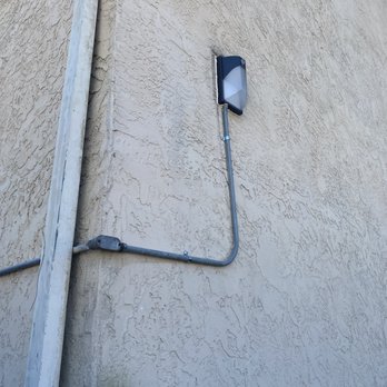 Just Installed Now - Reinstalled security lights at apartment complex to meet code - Electricians Near Me