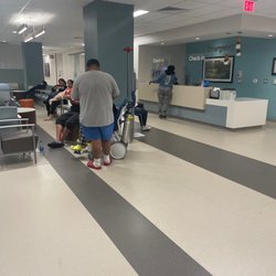 Adventist HealthCare White Oak Medical Center - Check in Nurse Arguing with yet another Patient super unprofessional