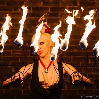 Spinnabel Lee Entertainment - Fire Fan Performance - just one of the many fire dancing tools used in our fire dancing shows! - Performing Arts Near Me Spinnabel Lee Entertainment - Fire Fan Performance - just one of the many fire dancing tools used in our fire dancing shows! - Performing Arts Near Me