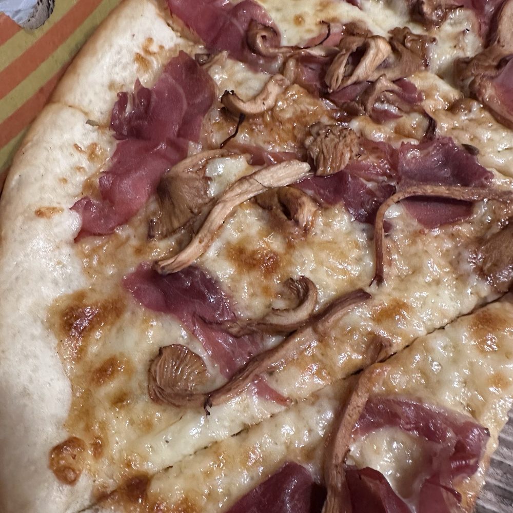 Pagliacci Pizza - Prosciutto and chanterelles - Pizza Near Me - Bellevue, Washington Pagliacci Pizza - Prosciutto and chanterelles - Pizza Near Me - Bellevue, Washington