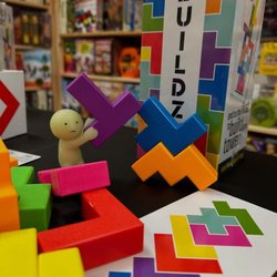 Five Little Monkeys - Corte Madera - Our #smiski friend Jingle decided to take a break on their journey through our stores to play a quick game of Buildzi!...