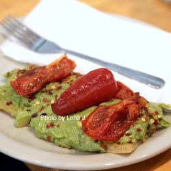 Revive + Replenish - Avocado Toast + Roasted Roma Tomatoes ($7.20) - avocado mashed w/ olive oil, lemon juice & sea salt on griddled flat bread