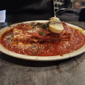 Salvatori's Authentic Italian Eatery - Auburn - Lasagna (Full Portion) swimming in sauce - Italian Near Me - Auburn, Indiana Salvatori's Authentic Italian Eatery - Auburn - Lasagna (Full Portion) swimming in sauce - Italian Near Me - Auburn, Indiana