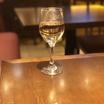 Olive Garden Italian Restaurant - A 6oz glass of the house moscato - Italian Near Me - Spring, Texas
