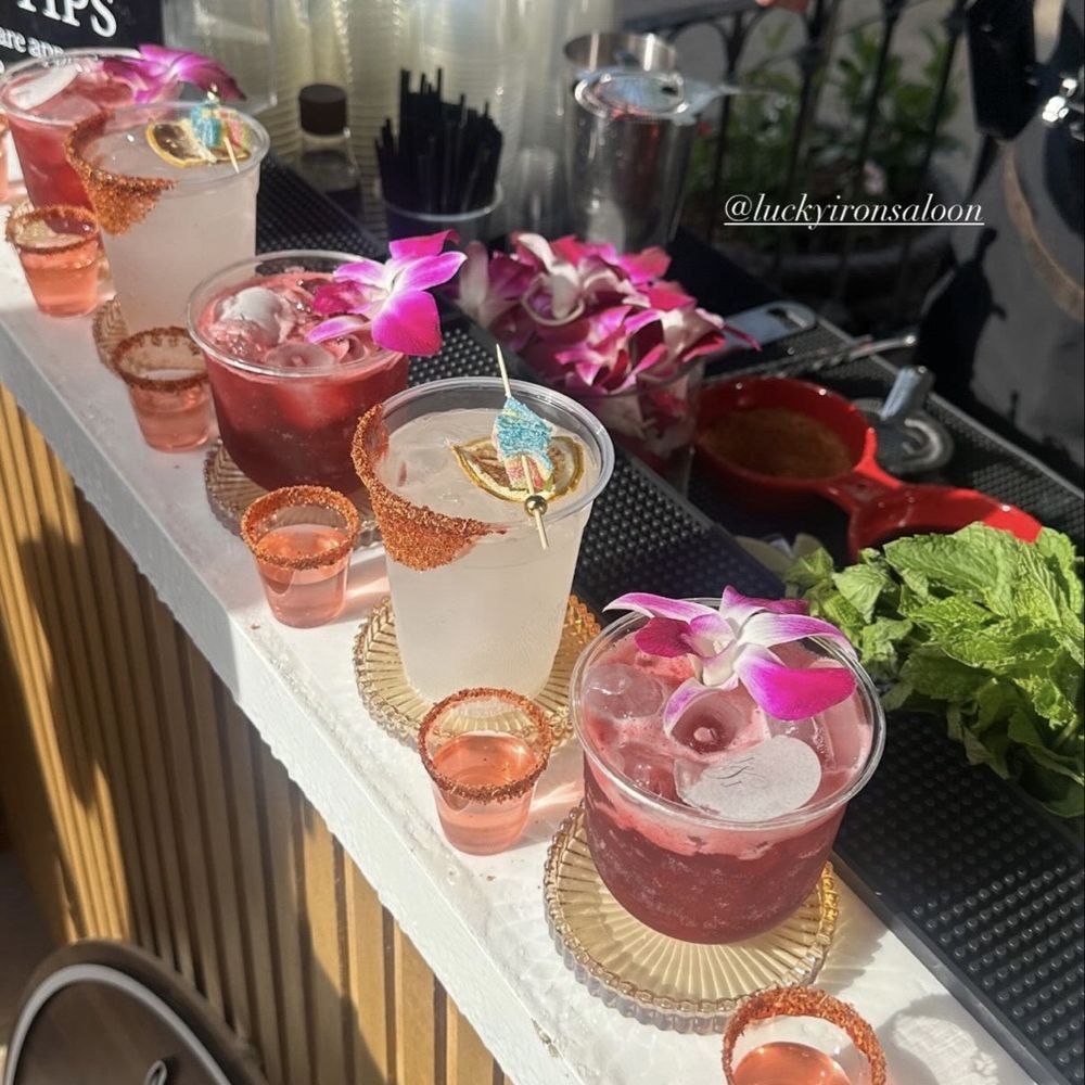 Lucky Iron Saloon - Bar set up with drinks we chose (cucumber lemon mojito, Paloma, hibiscus margarita, candy shot) - Bartenders Near Me Lucky Iron Saloon - Bar set up with drinks we chose (cucumber lemon mojito, Paloma, hibiscus margarita, candy shot) - Bartenders Near Me