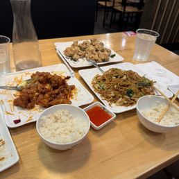 Popcorn Chicken, veggie chow mein, & orange chicken with white rice.