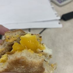 McDonald's - Undercooked runny egg yolk in my sausage egg n cheese sandwich.