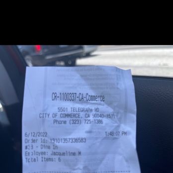 Carl's Jr - a receipt in the passenger seat of a car - Fast Food Near Me - Commerce City, Colorado