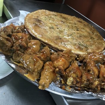 Bella T's Pizza - a platter of food - Pizza Near Me - Philadelphia, Pennsylvania