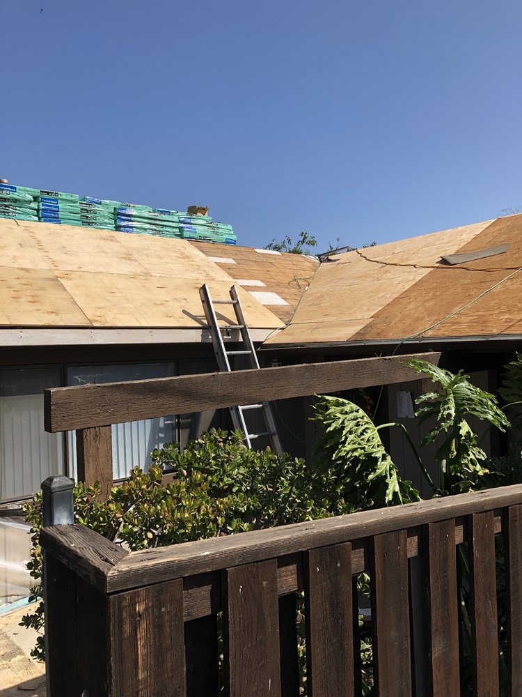 Slide of RJC Roofing