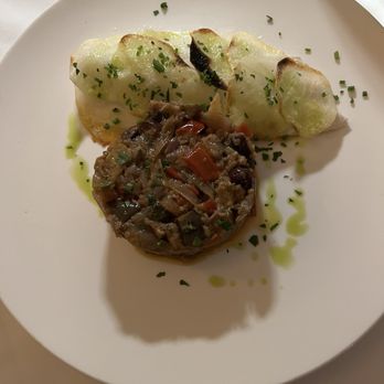 Two25 - This is the Branzino, an European white fish with potato crust and vegetables.This fish prepared properly tasted wonderful! - Italian Near Me - Locust Valley, New York